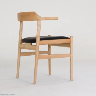 Microfiber Final Chair in natural ash by Hans Wegner, back right facing view.