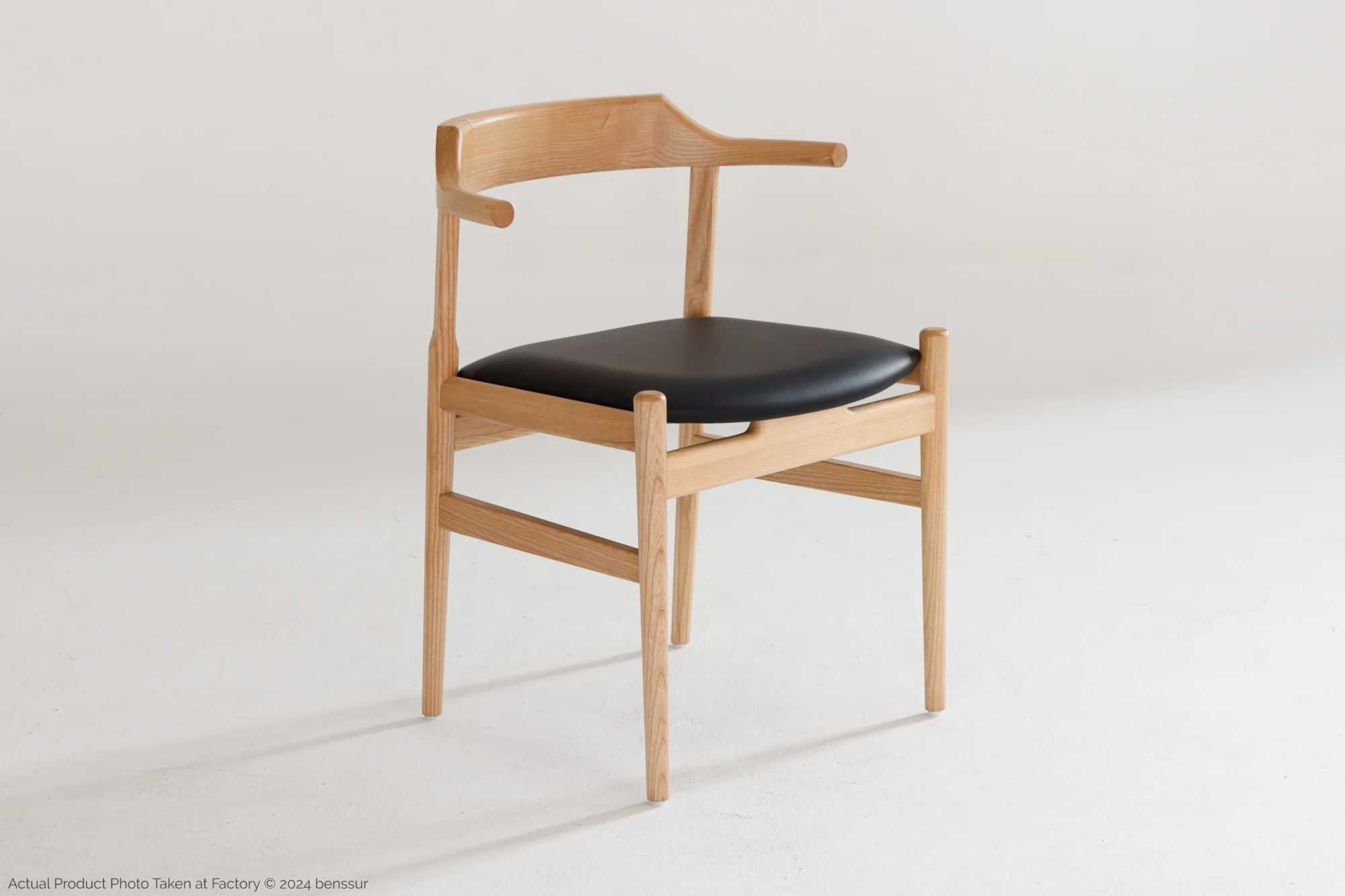 Microfiber Final Chair in natural ash by Hans Wegner, front right facing view.