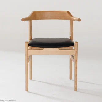 Microfiber Final Chair in natural ash by Hans Wegner, front facing view.