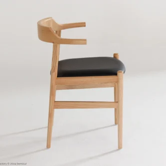 Microfiber Final Chair in natural ash by Hans Wegner, right facing view.