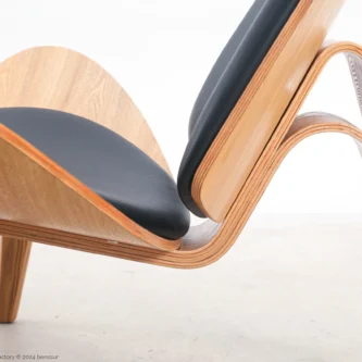 Detail of microfiber leather Shell Chair in natural plywood by Hans Wegner.