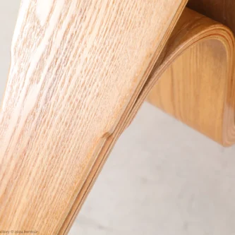 Detail of microfiber leather Shell Chair in natural plywood by Hans Wegner.