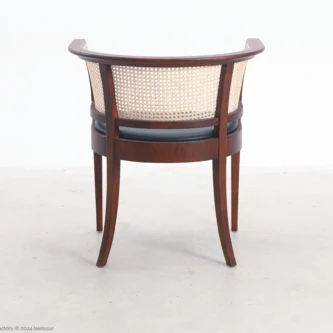 Microfiber leather Faaborg Chair in dark brown ash by Kaare Klint, back facing view.