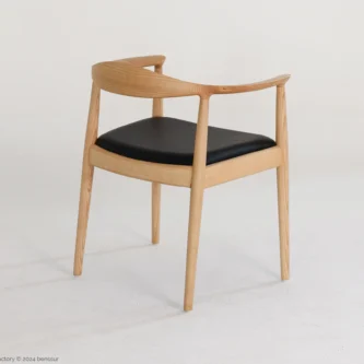 Microfiber Round Chair in natural ash by Hans Wegner, back right facing view.