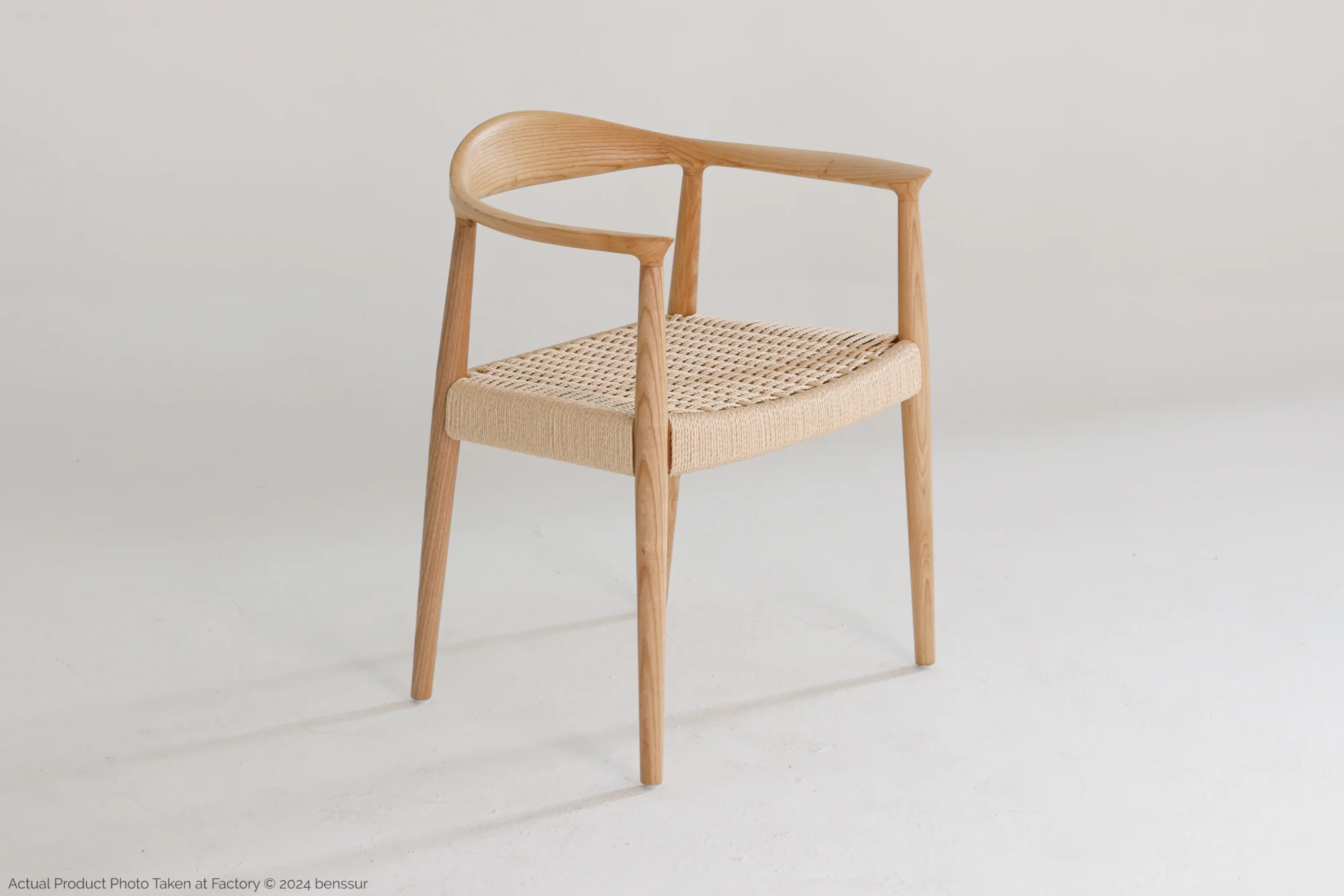 Paper Rope Round Chair in natural ash by Hans Wegner, front right facing view.