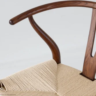 Detail of Paper Rope Wishbone Chair in dark brown ash by Hans Wegner.