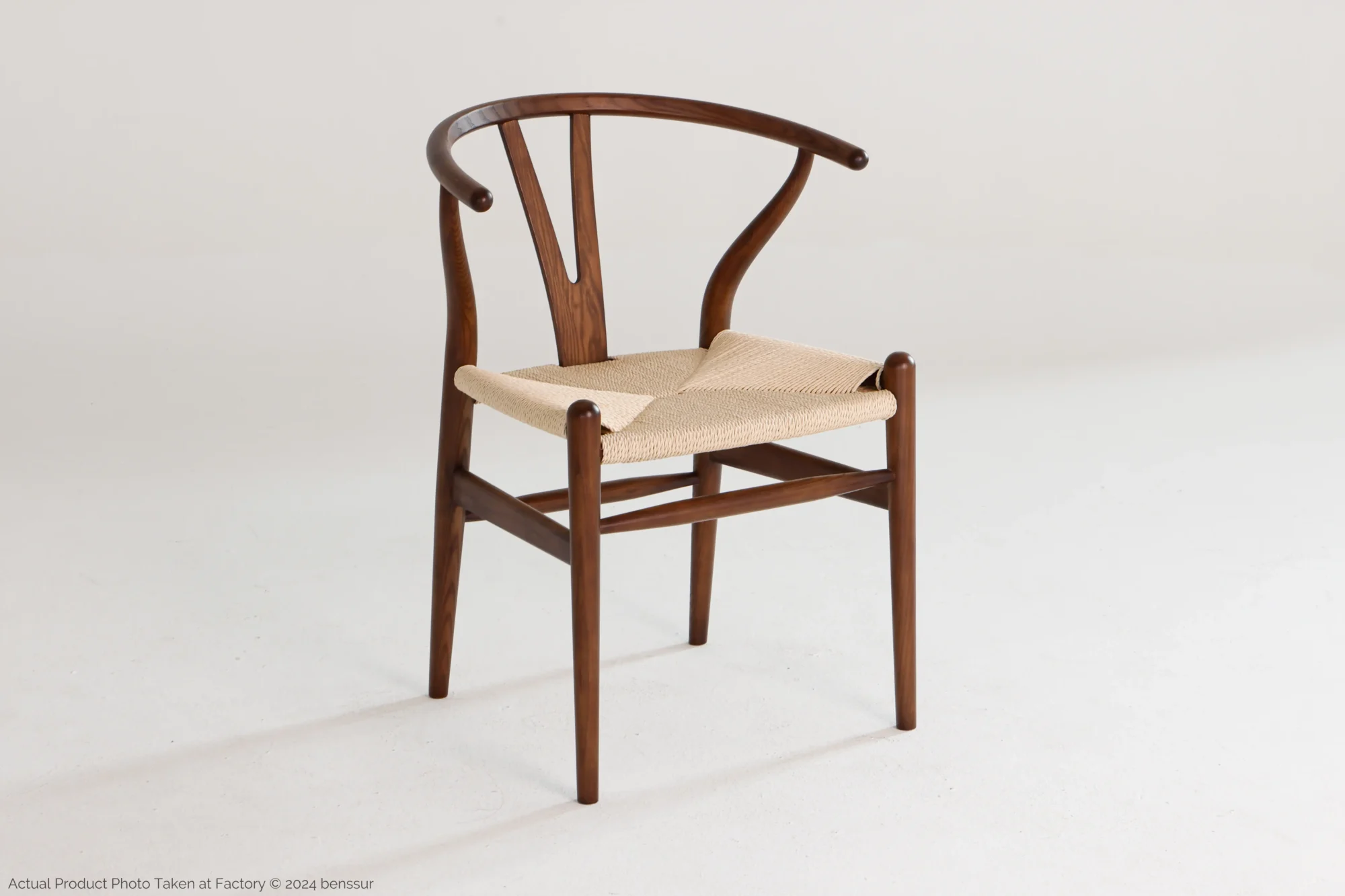 Paper Rope Wishbone Chair in dark brown ash by Hans Wegner, front right facing view.