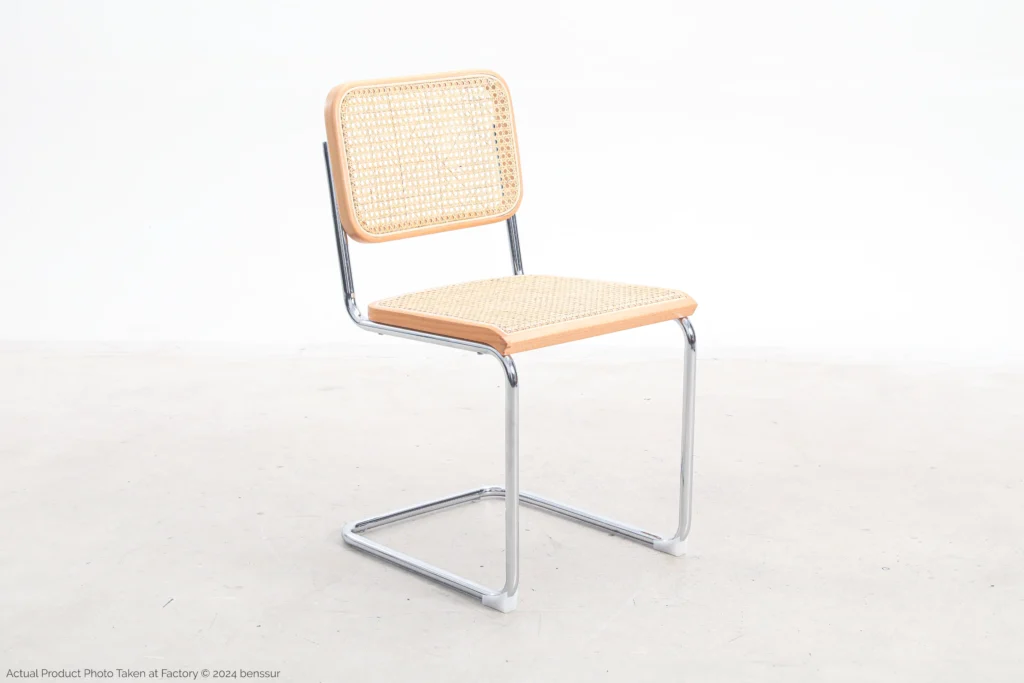 Woven caning B32 Cesca Chair in natural beech by Marcel Breuer, front right facing view.