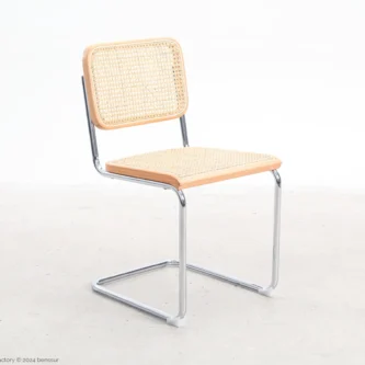 Woven caning B32 Cesca Chair in natural beech by Marcel Breuer, front right facing view.