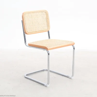 Woven caning B32 Cesca Chair in natural beech by Marcel Breuer, front right facing view.