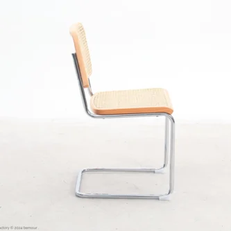 Woven caning B32 Cesca Chair in natural beech by Marcel Breuer, right facing view.