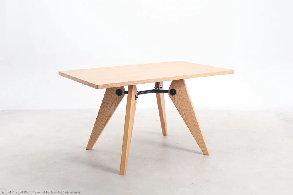 S.A.M No.502 Table in natural ash veneer by Jean Prouvé, angle view.