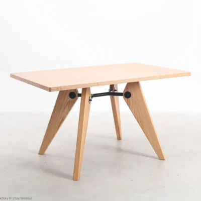 S.A.M No.502 Table in natural ash veneer by Jean Prouvé, angle view.