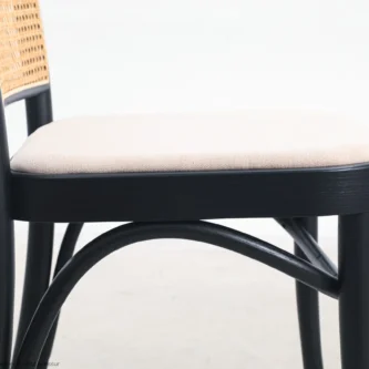 Detail of upholstered No.811 Chair in black ash by Josef Hoffmann.