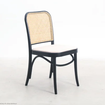 Upholstered No.811 Chair in black ash by Josef Hoffmann, front right facing view.