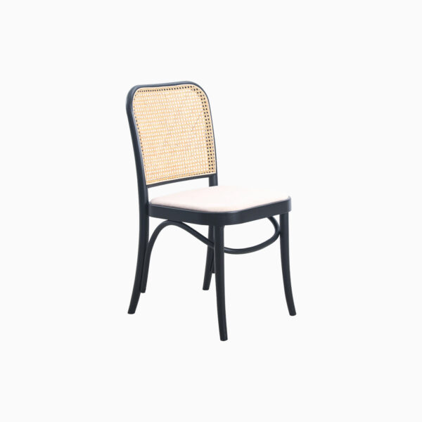 A wooden chair with a curved black frame, a woven cane backrest, and a light-coloured cushioned seat, shown against a plain white background.