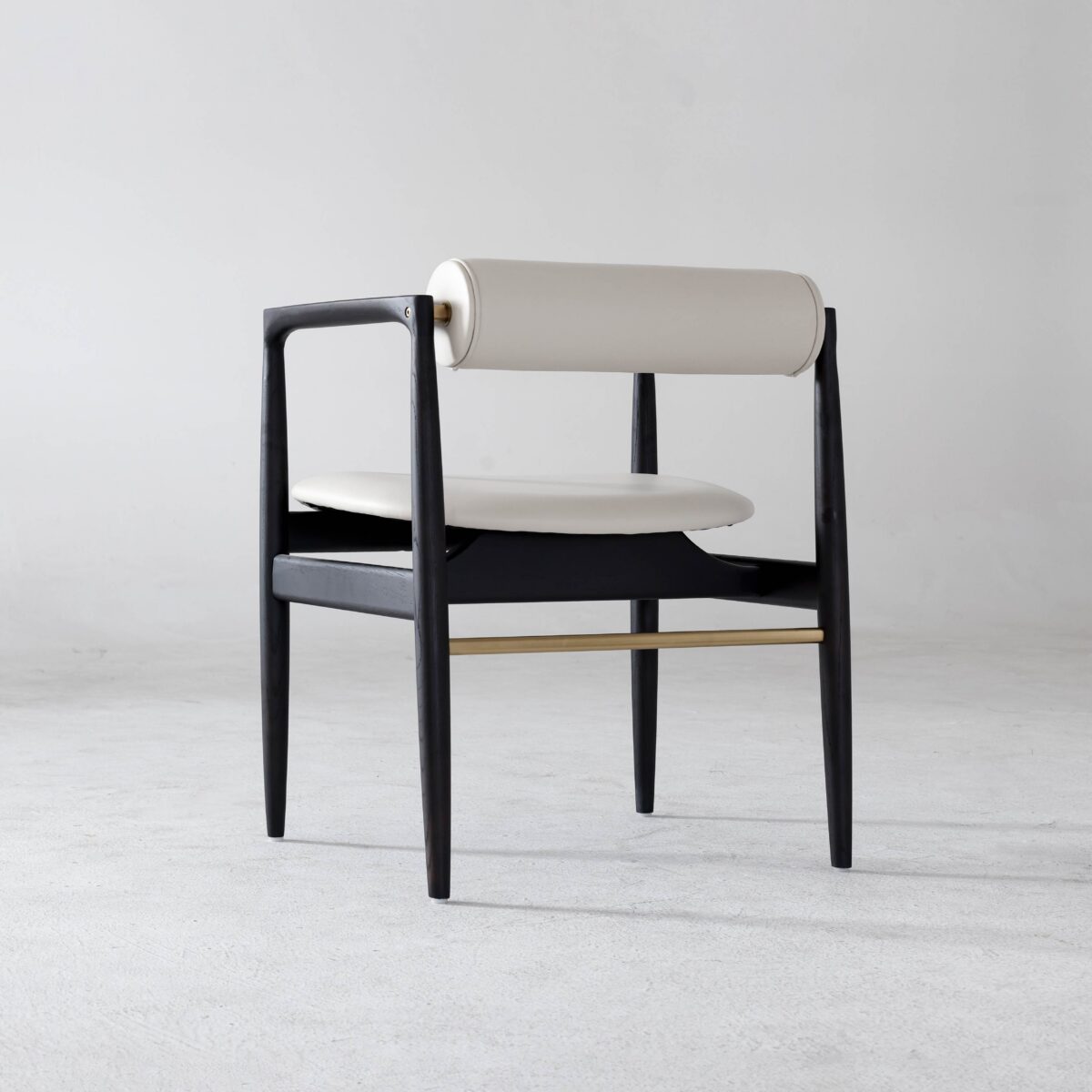 Black Frame + White Seat_B1 A modern chair with a black wooden frame, a rounded white-cushioned backrest, and a matching white seat, set against a plain light grey background.