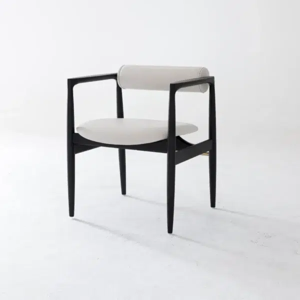 A modern chair with a black wooden frame, rounded legs, a circular light grey cushioned seat, and a matching cylindrical backrest, set against a plain white background.