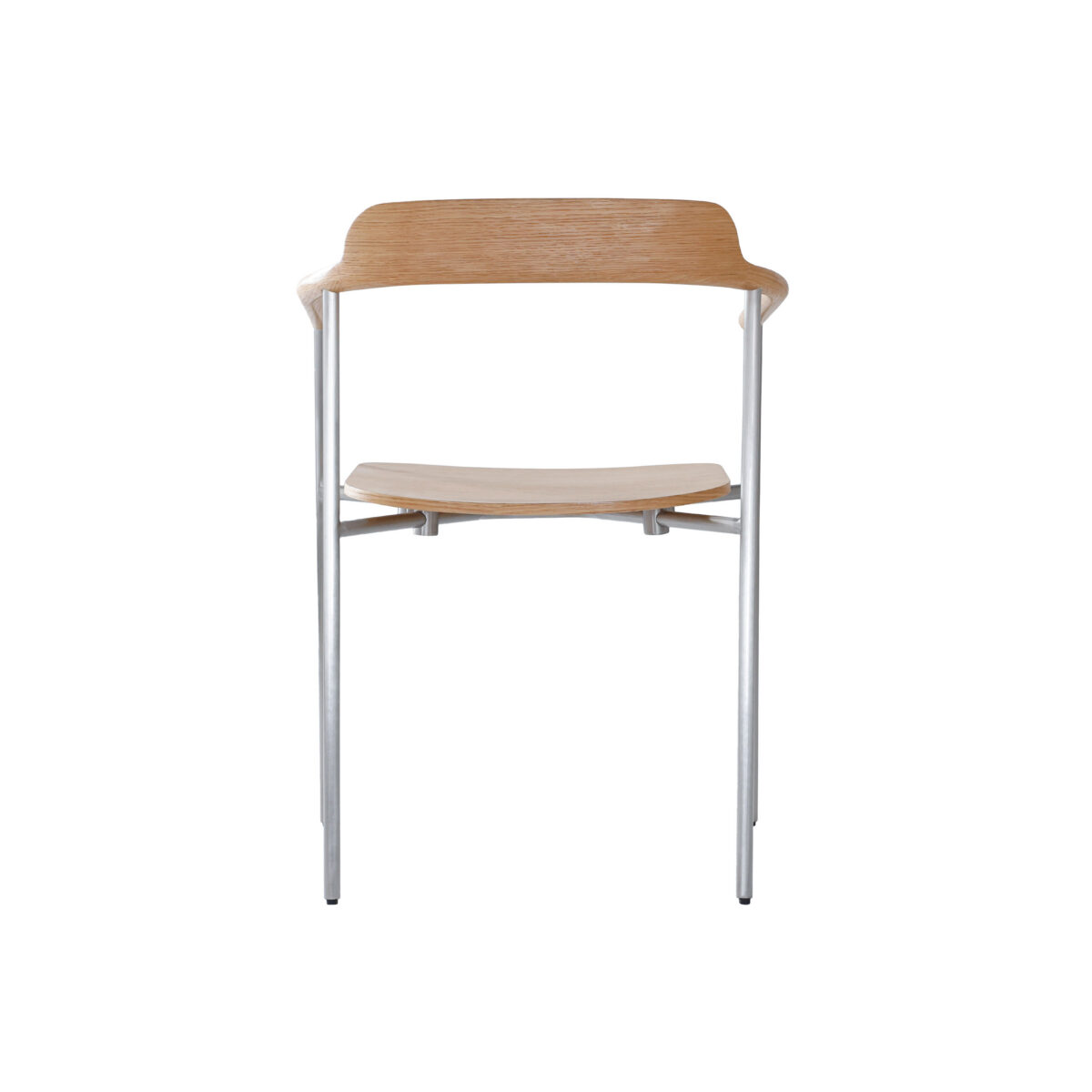 Gentleman Dining Chair_Natural_White Background(2) A minimalist wooden chair with a curved backrest and seat, supported by slim, silver metal legs, photographed against a plain white background.