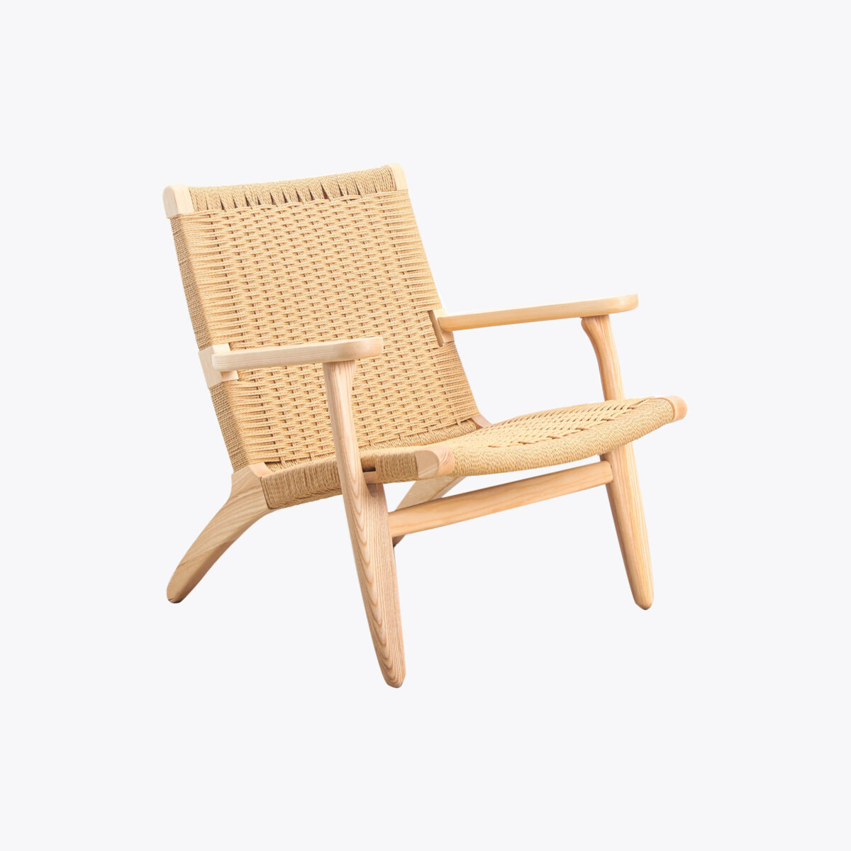 A modern lounge chair with a light wooden frame and woven natural cord seat and backrest, featuring wide armrests and an angled, low-slung design.