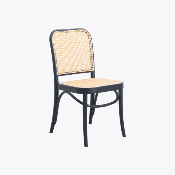 A wooden chair with a black frame, curved legs, and a woven rattan seat and backrest, set against a plain light grey background.