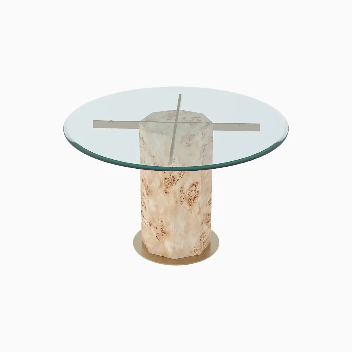 Round glass-top table with a cylindrical, cream-coloured textured base and metallic crossbars supporting the glass.