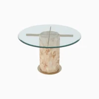 Round glass-top table with a cylindrical, cream-coloured textured base and metallic crossbars supporting the glass.